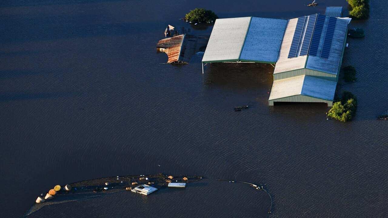 Submerged houses seen from a helicopter in flood affected areas in Windsor and Pitt Town near the Hawkesbury River.