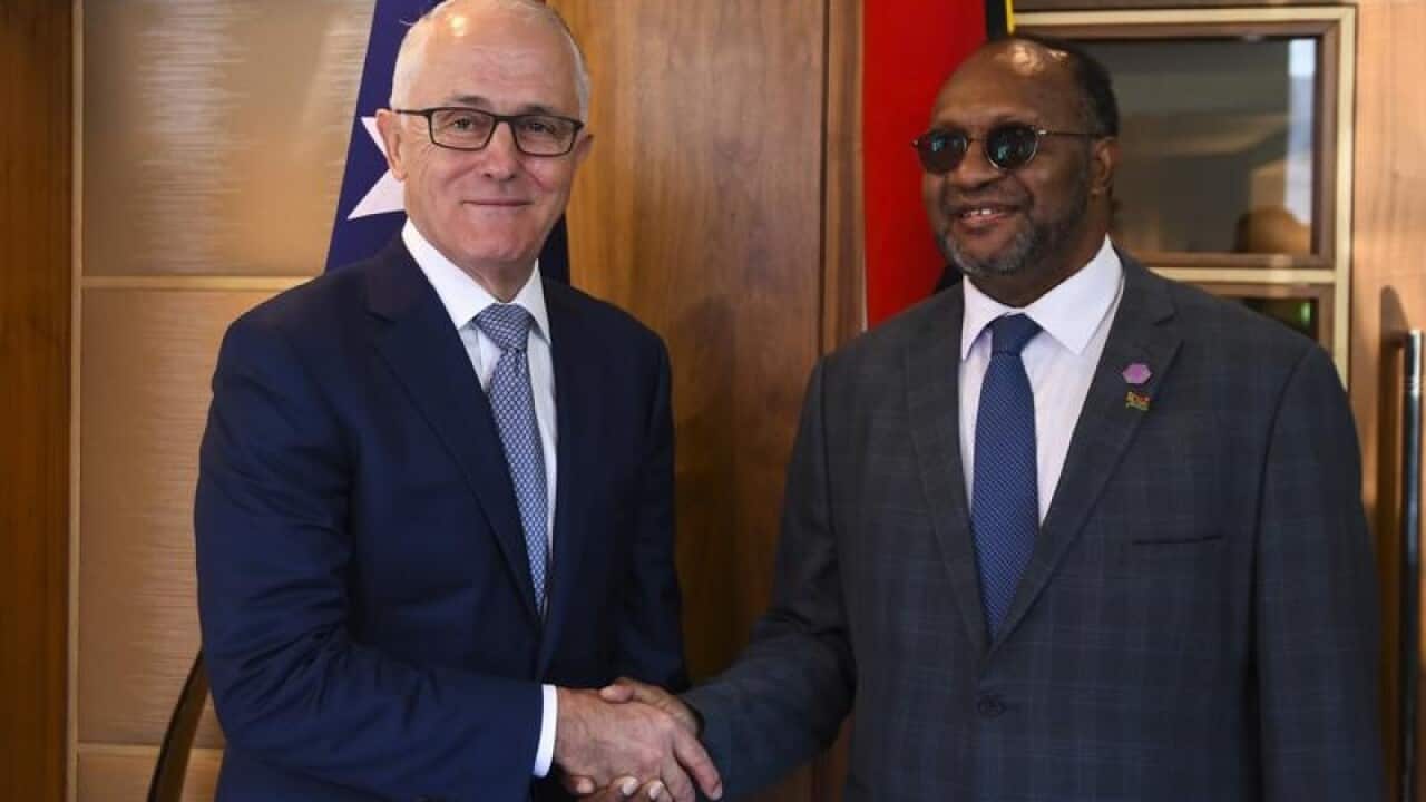 Malcolm Turnbull and Charlot Salwai.