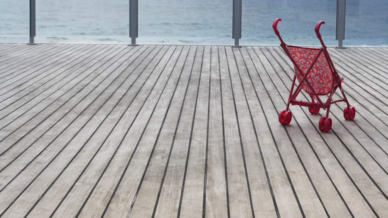 Baby stroller on wooden Dock