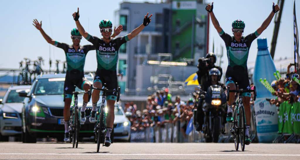 Max Schachmann takes the win ahead of team mates Marcus Burghardt and Andreas Schillinger (Supplied)