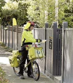 Posties are perhaps Australia’s most visible slow cyclists. (AAP/Australia Post)