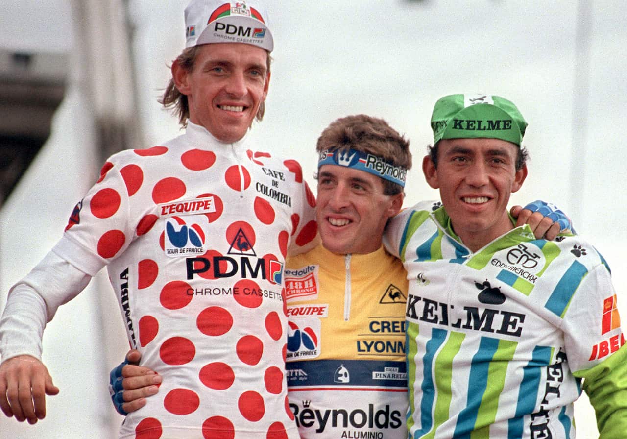The 1988 Tour podium: winner Pedro Delgado (C), Steven Rooks (L) 2nd overall, and Fabio Parra (R), third, and the first Colombian to finish on the podium.