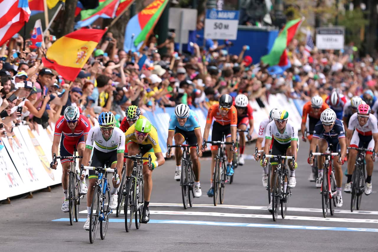 As Matthews and Gerrans both sprint for second.