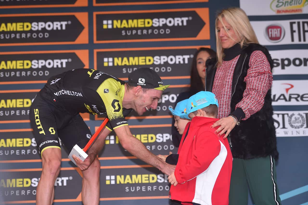 Adam Yates with Michele Scarponi's widow Anna and children Giancomo and Tommasco (Getty)
