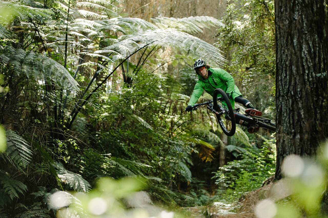 Mitch Ropelato flies sideways through the air on a bike