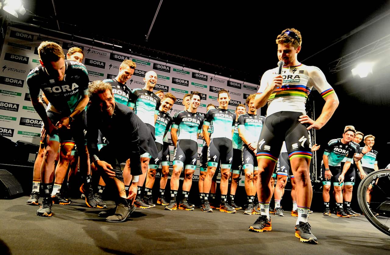 Ralph Denk showing off his new Peter Sagan logo tattoo (Bora-hansgrohe/Veloimages)