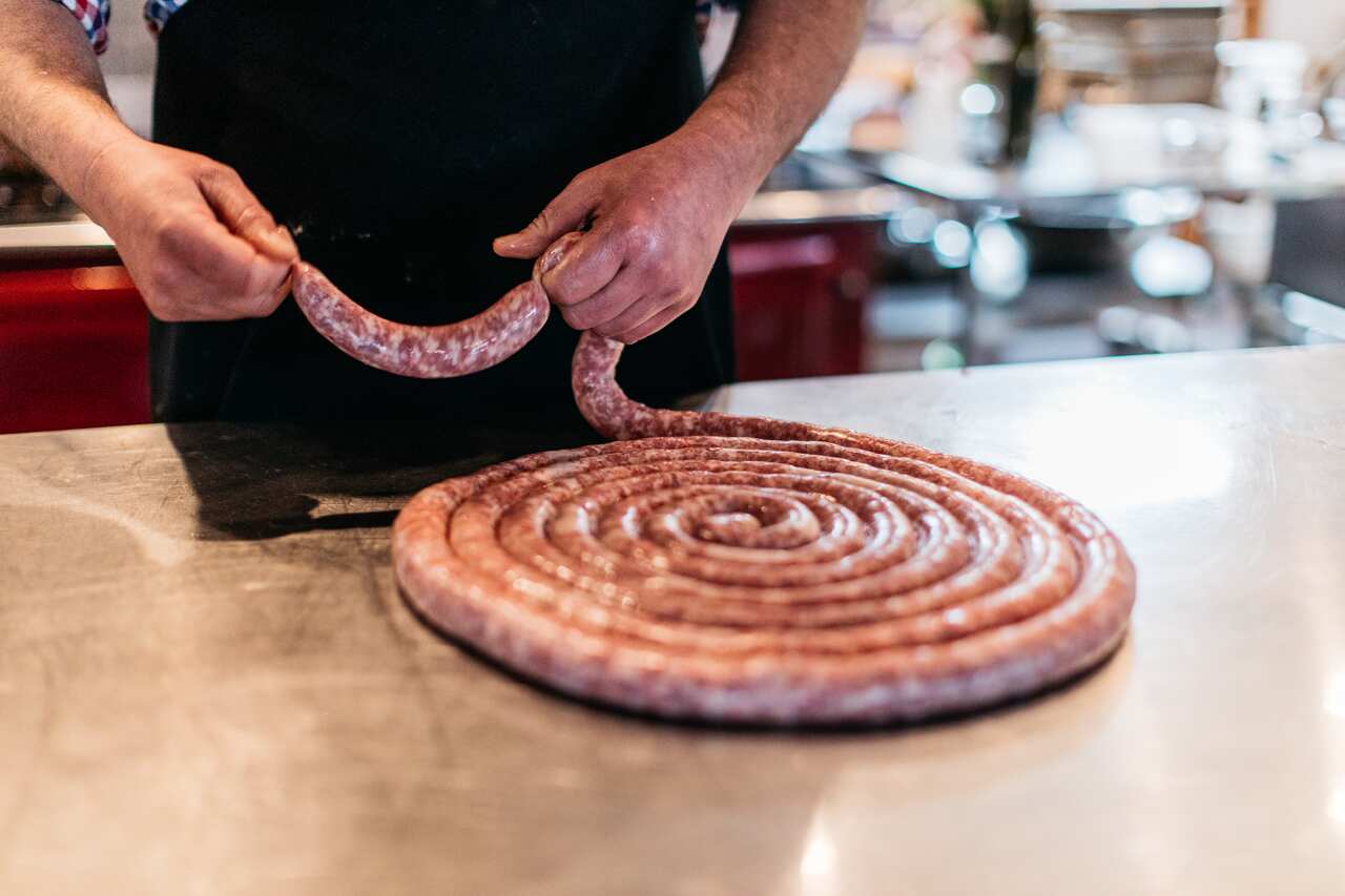 Rolling sausages at Fat Pig Farm