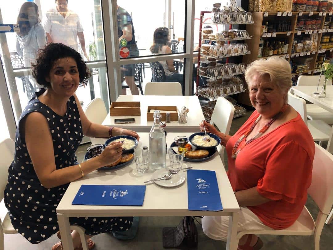 Tania and Lidia enjoying hot ricotta
