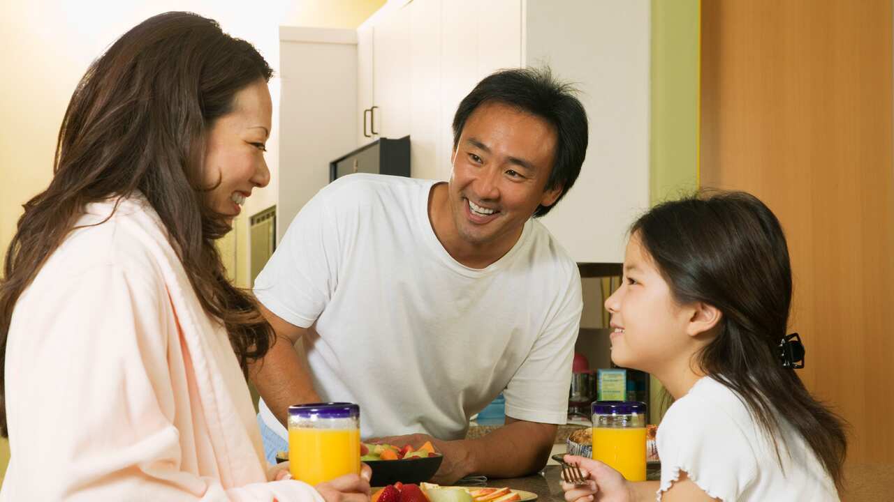 Japanese parents and child eating healthy food