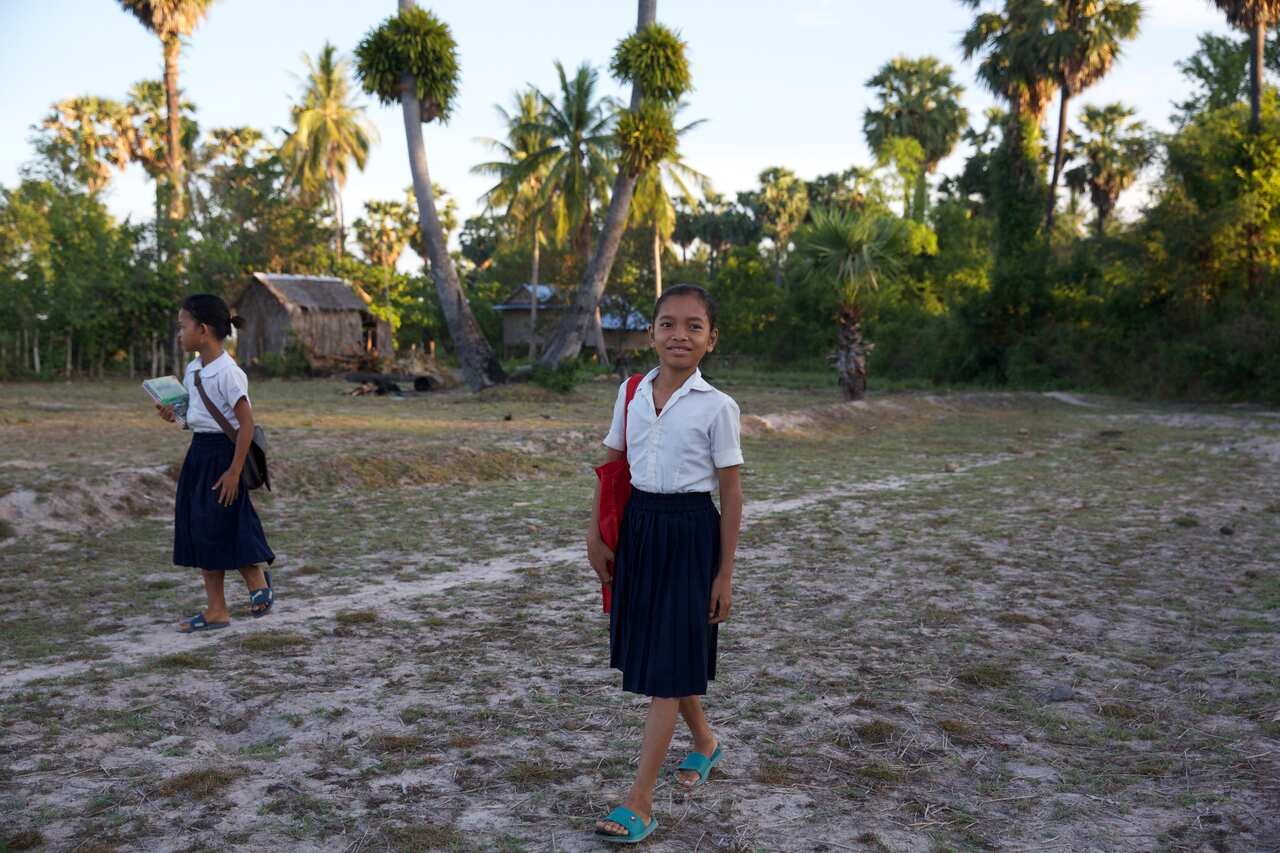 Sokhat who lives in Cambodia, receives food rations and a daily breakfast through Plan International's School Feeding Program.