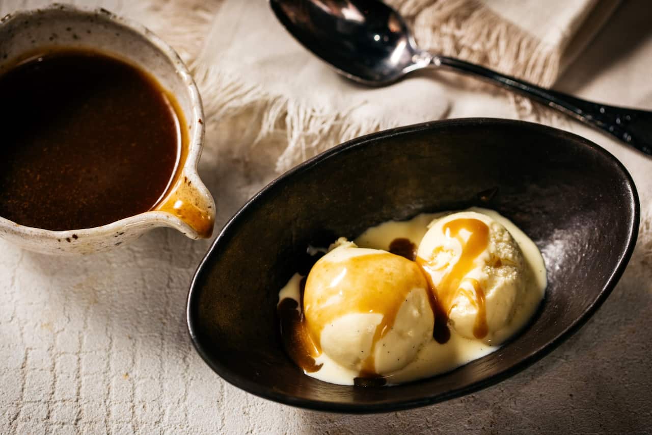 Wasabi-scented butterscotch sauce with anglaise and ice cream