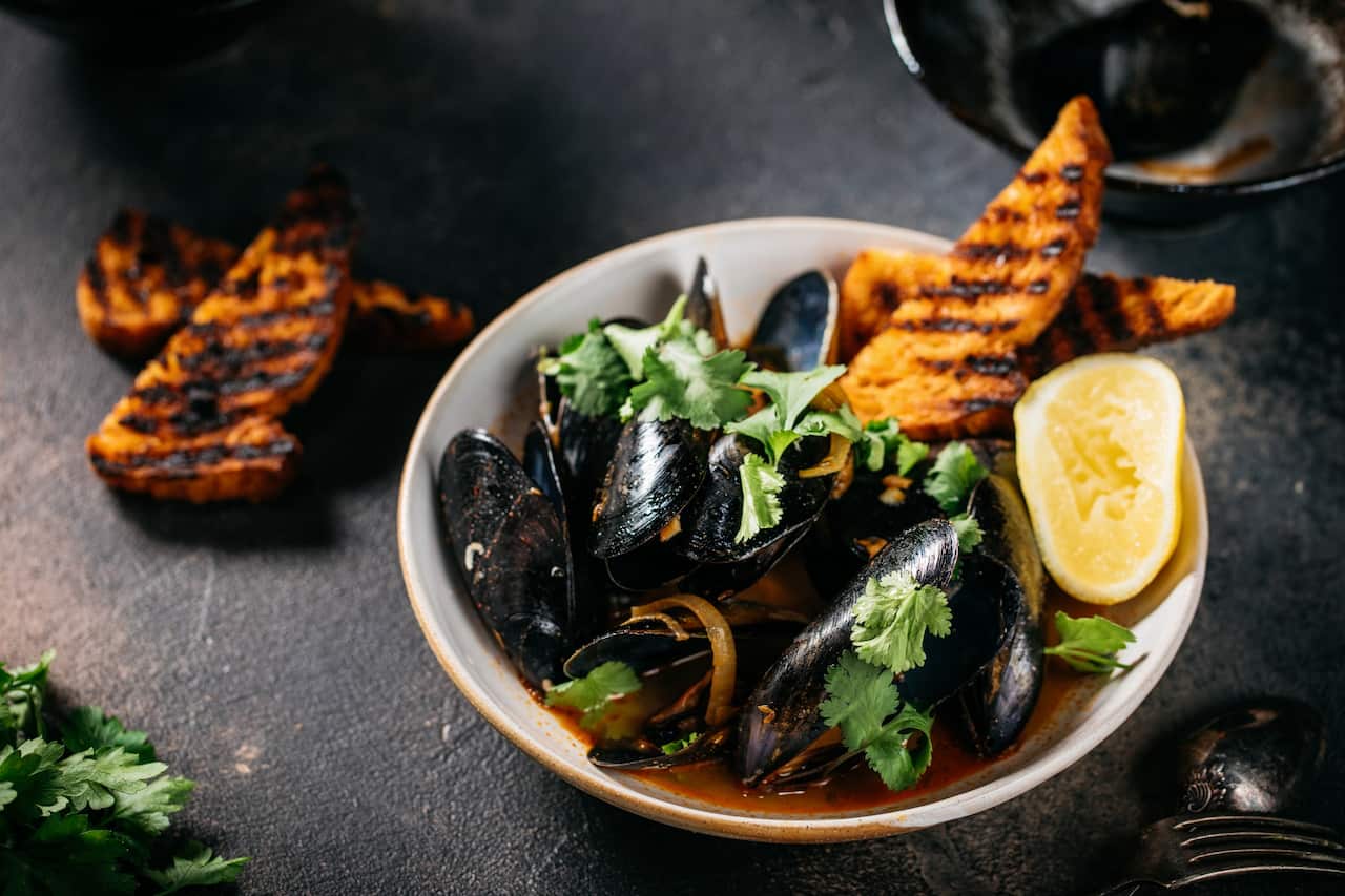 Mexican beer mussels with charred sourdough