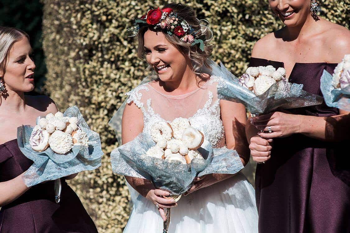 Paige and her bridesmaids, with the bouquets.