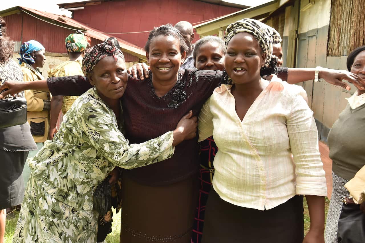 Zeddy Rotich (Right) with other members of Kabngetuny Women in Coffee