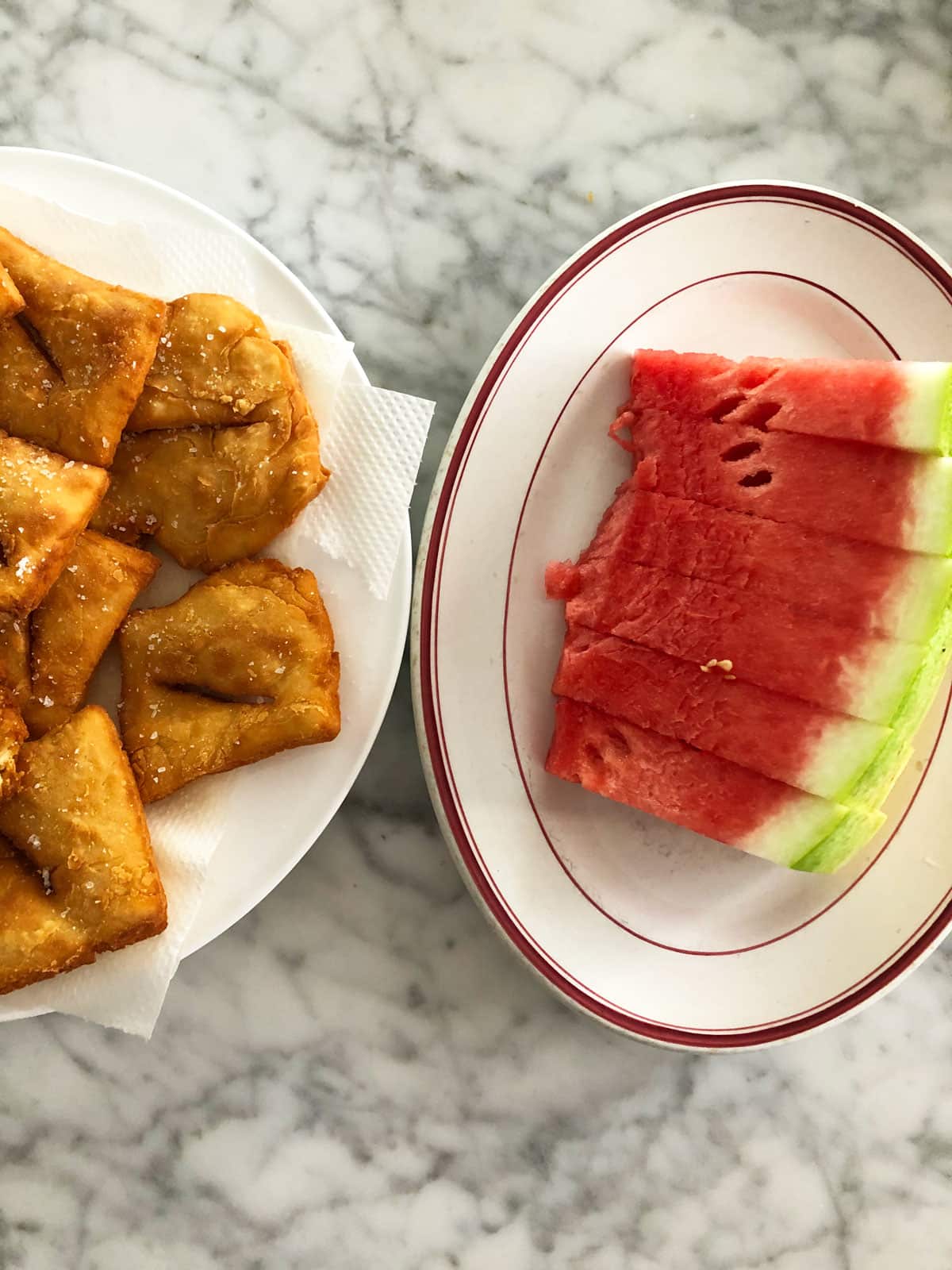 Watermelon and savoury doughnuts are a typical Mennonite snack.