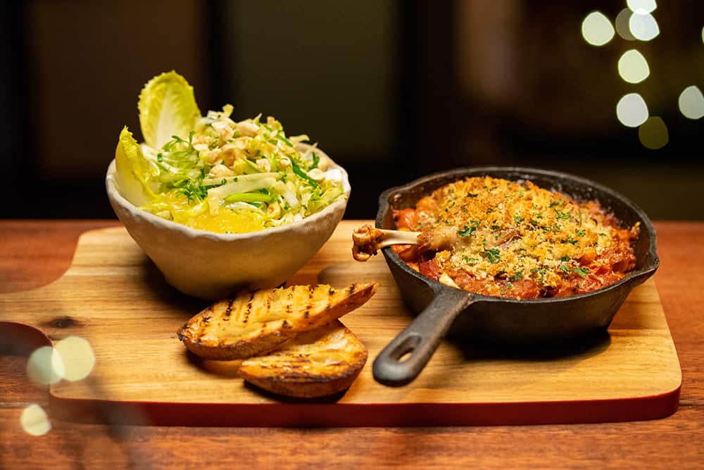 Duck cassoulet with orange, apple and hazelnut salad (Cassoulet de canard et salade frisée a l’orange, pomme et noisette)