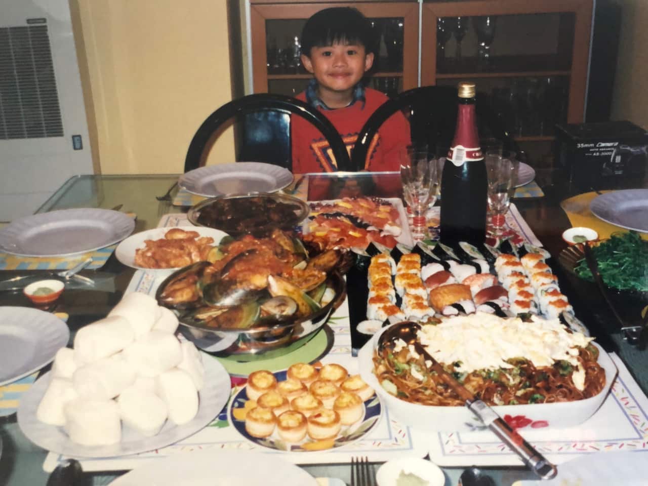 Vincent Yeow Lim enjoying a family feast shortly before moving to Australia.
