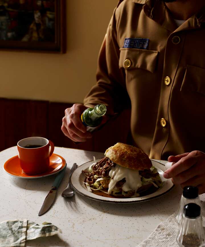 Biscuits with pulled brisket and milk gravy