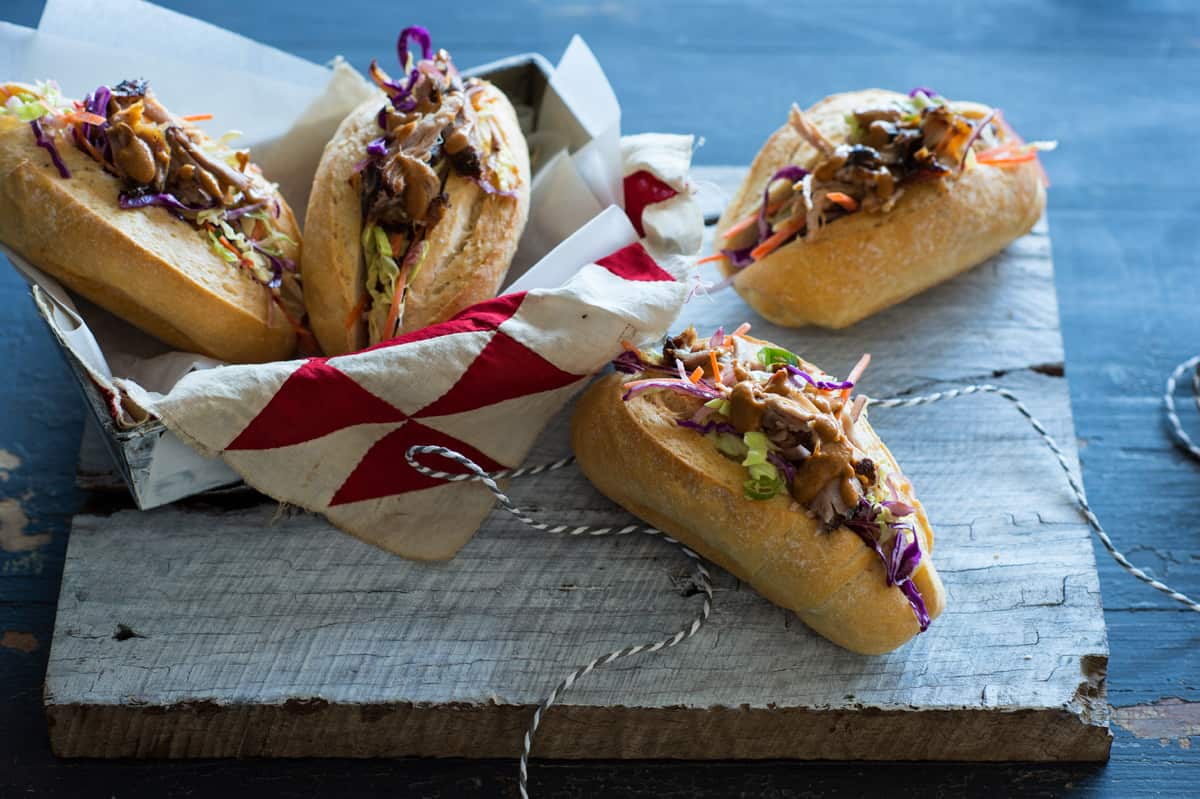 Spicy pulled pork rolls with coleslaw and barbecue sauce