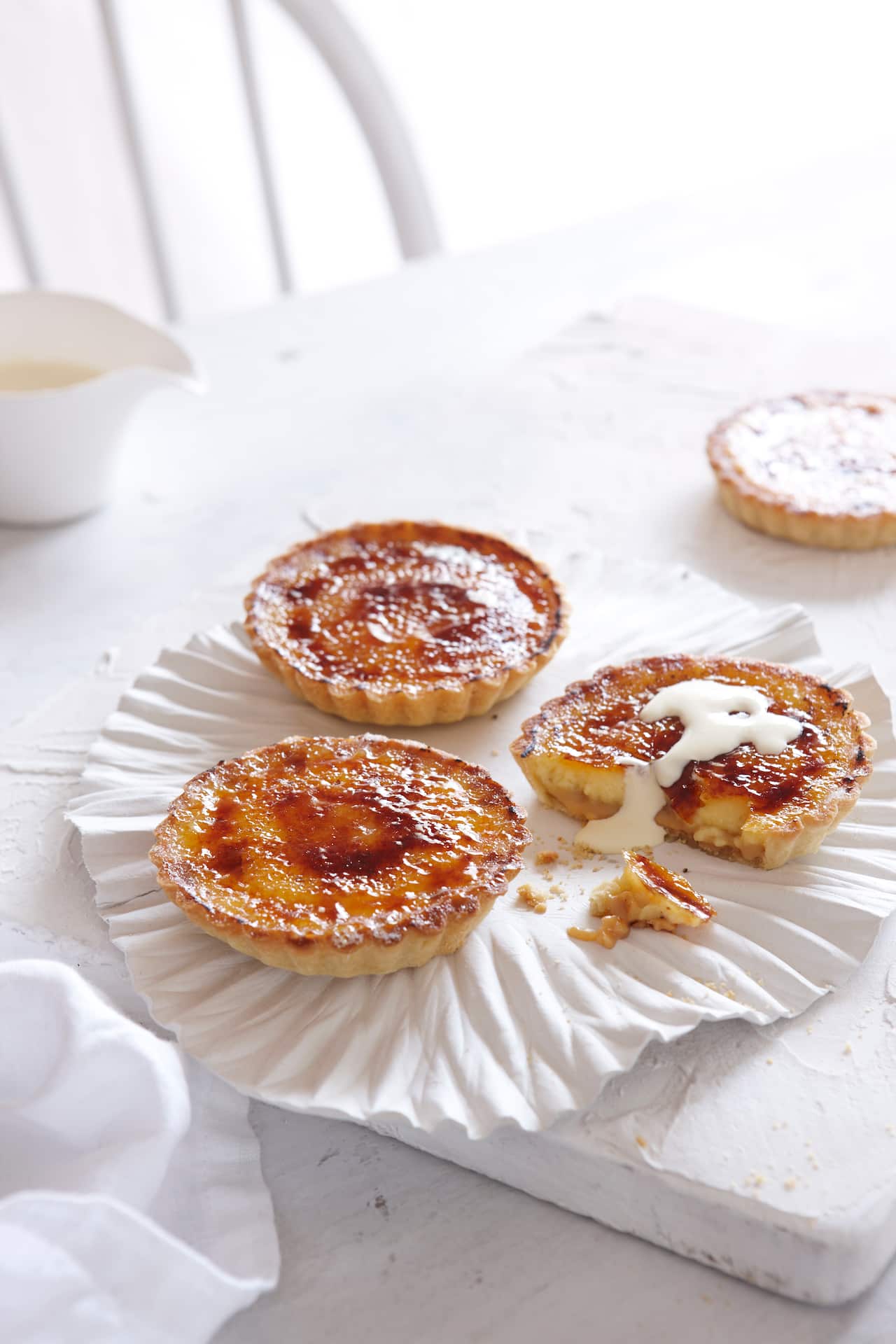 Caramel cream tartlets with almond pastry