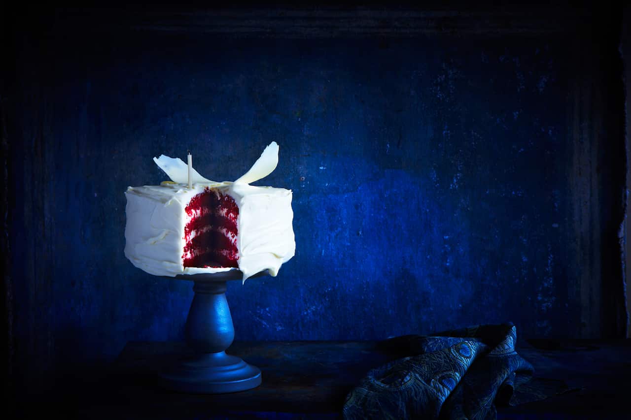 Red velvet layer cake with fresh raspberries and mascarpone icing