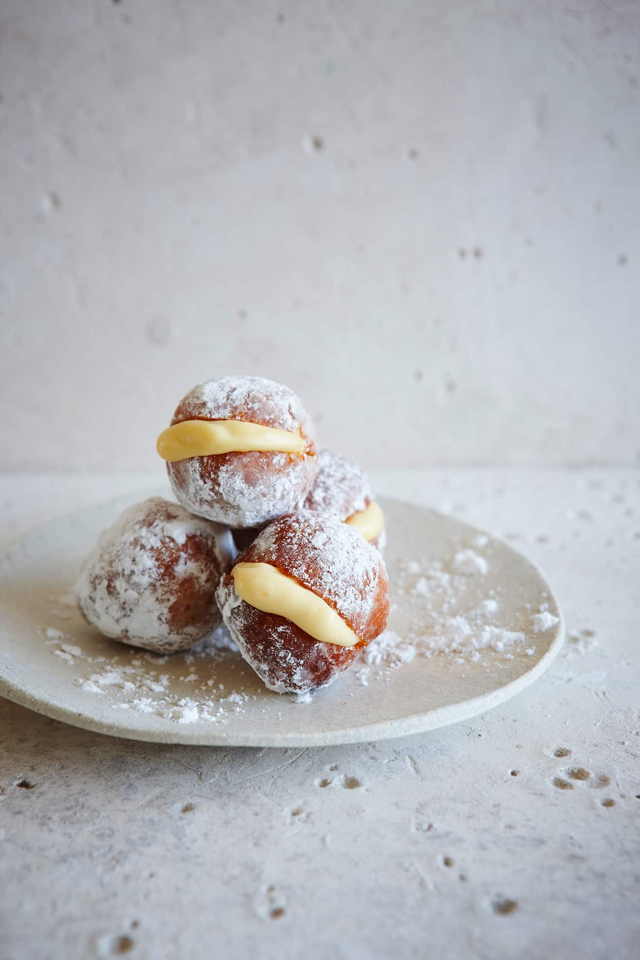 Honey bombolini with vanilla bean custard