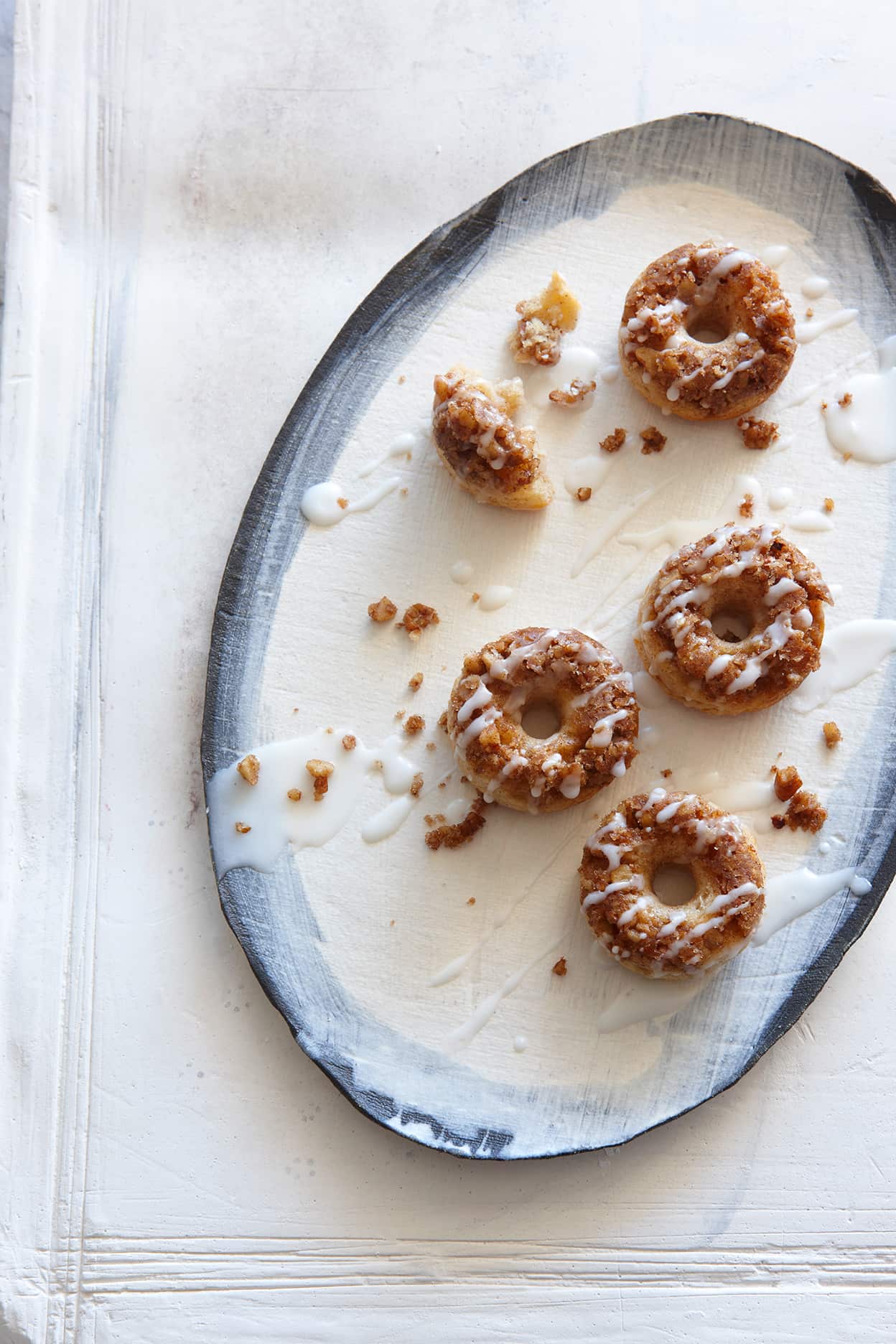 Mini pecan crumble doughnuts with lemon glaze
