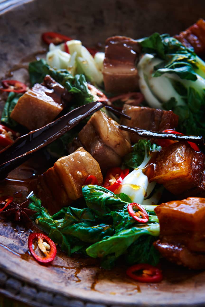 Crispy pork belly with palm sugar caramel sauce and steamed baby buk choy
