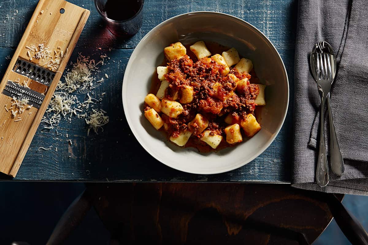 Red Desiree gnocchi with spicy chicken heart and tomato ragù