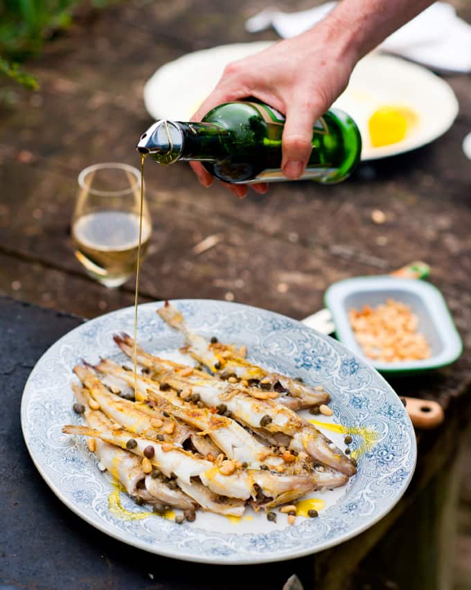 Barbecued whole whiting with capers and pine nuts