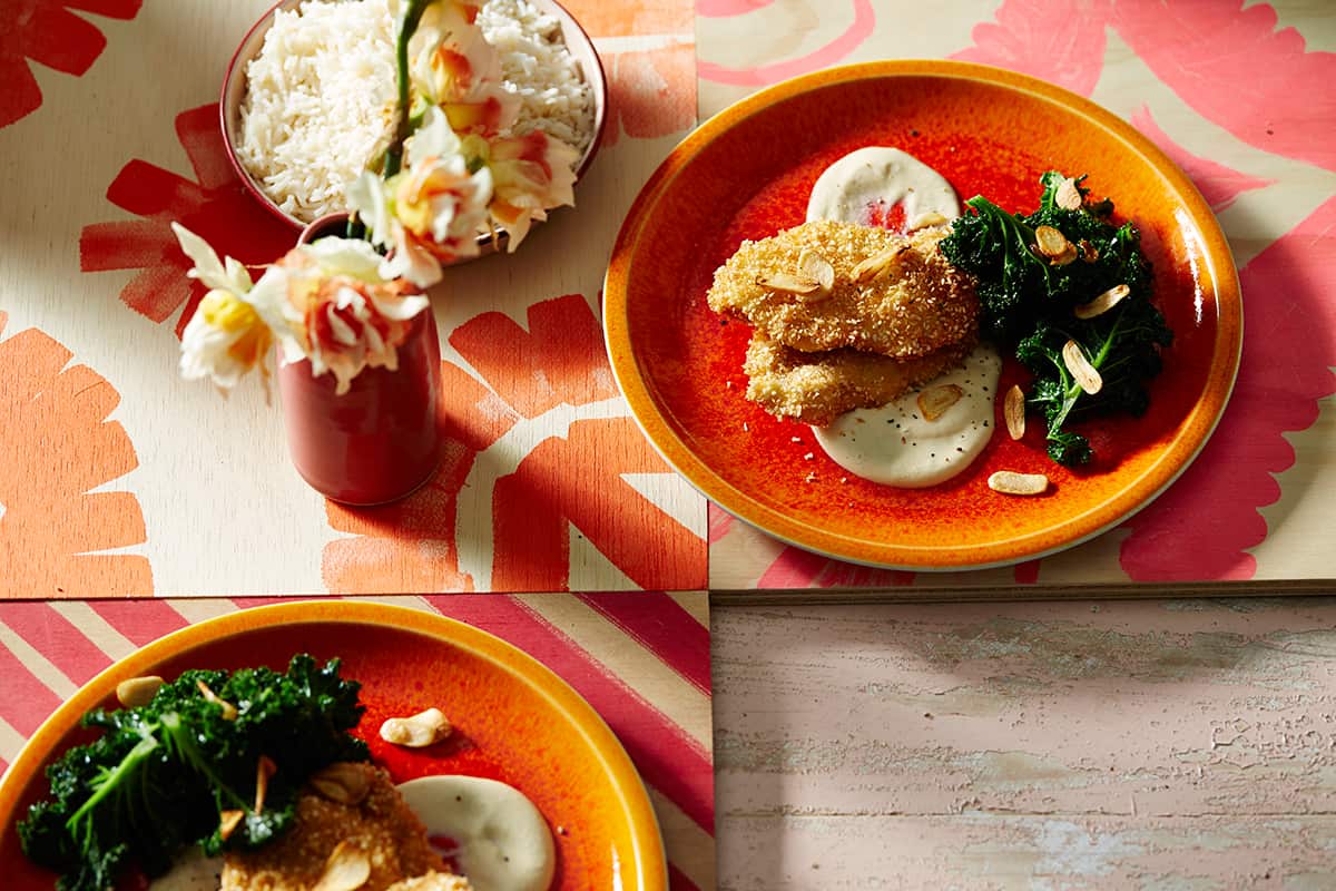 Sesame chicken and sautéed kale with miso tahini cream