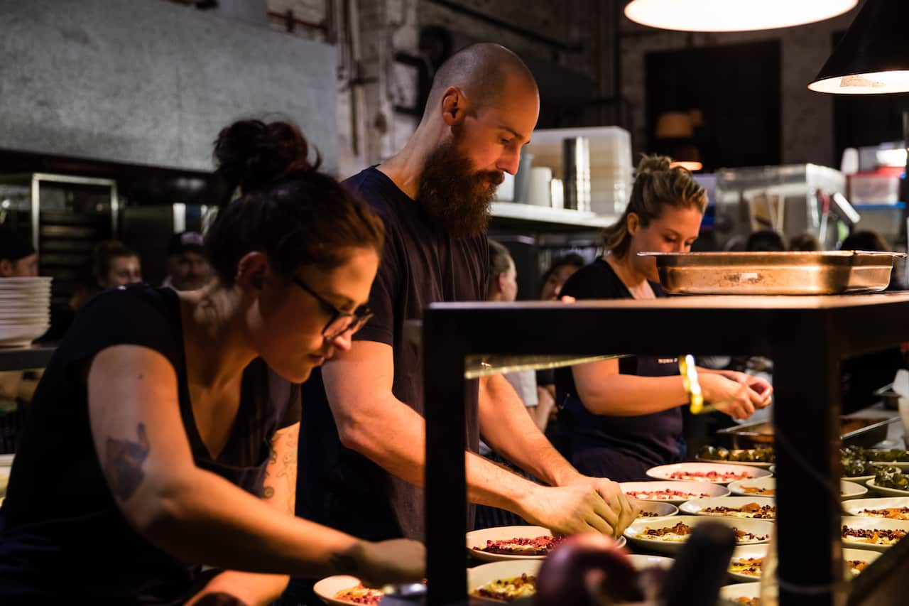 Chefs preparing dishes at 2018 Cook For Syria