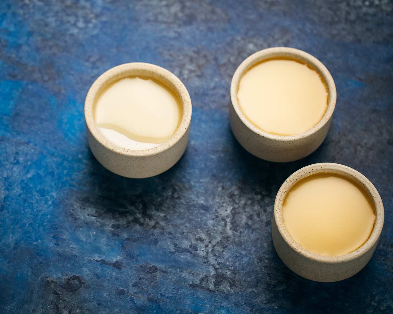 Almond pudding with ginger and palm sugar syrup