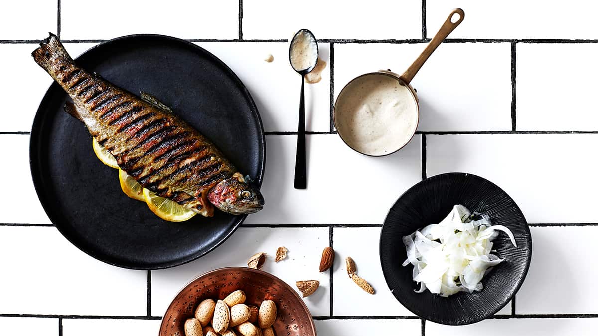 Chargrilled river trout with almond and aniseed sauce