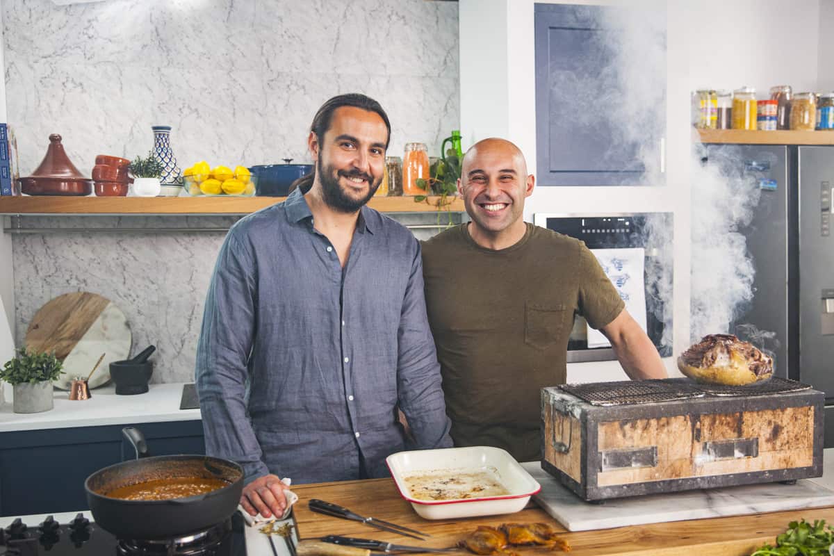 Tom Sarafian (left) joins Shane Delia to make some family favourites. 