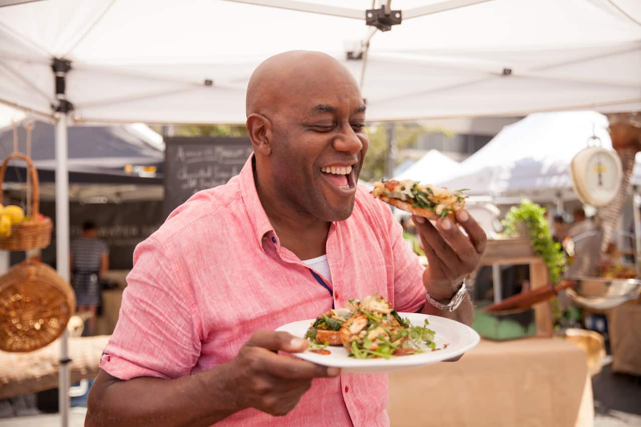 Ainsley Harriott eating