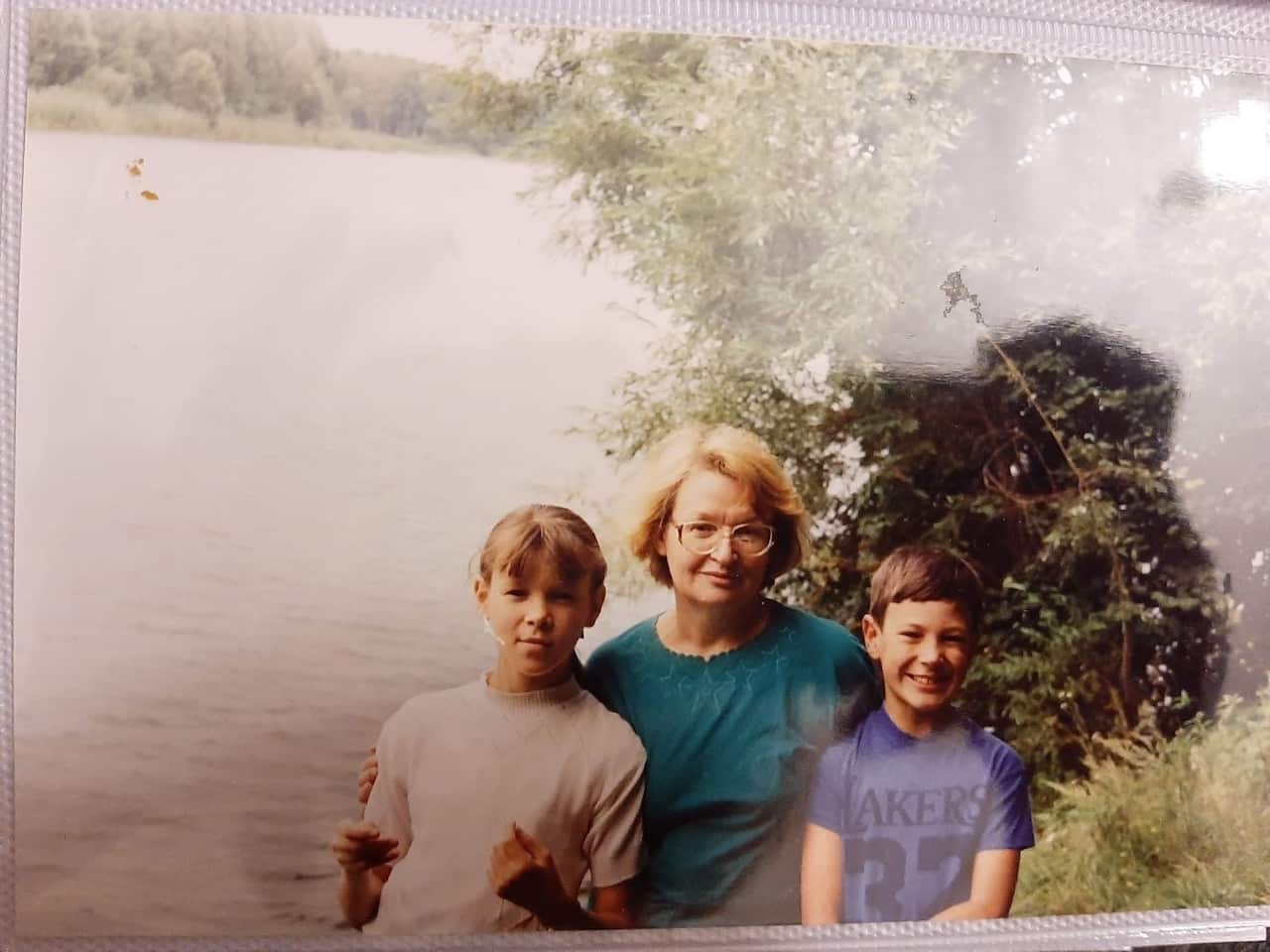 Anna as a child (left) with grandma Sveta.