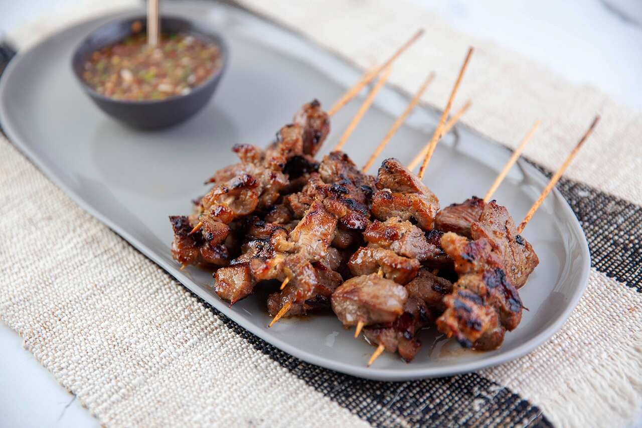 Grilled pork skewers with nahm jim jaew dipping sauce