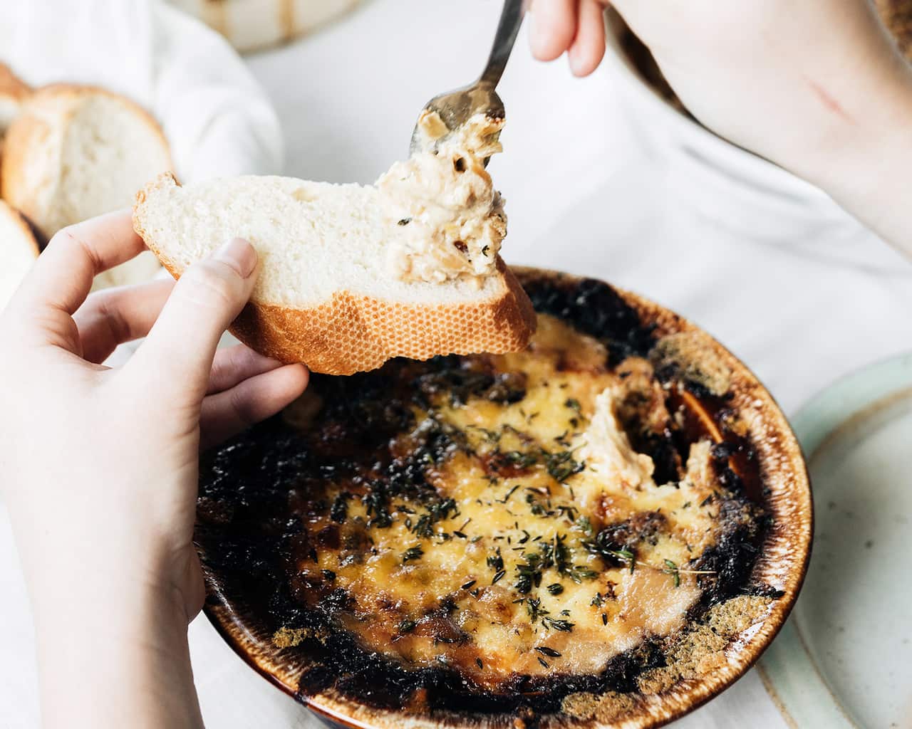 Baked caramelised onion and cheese fondue