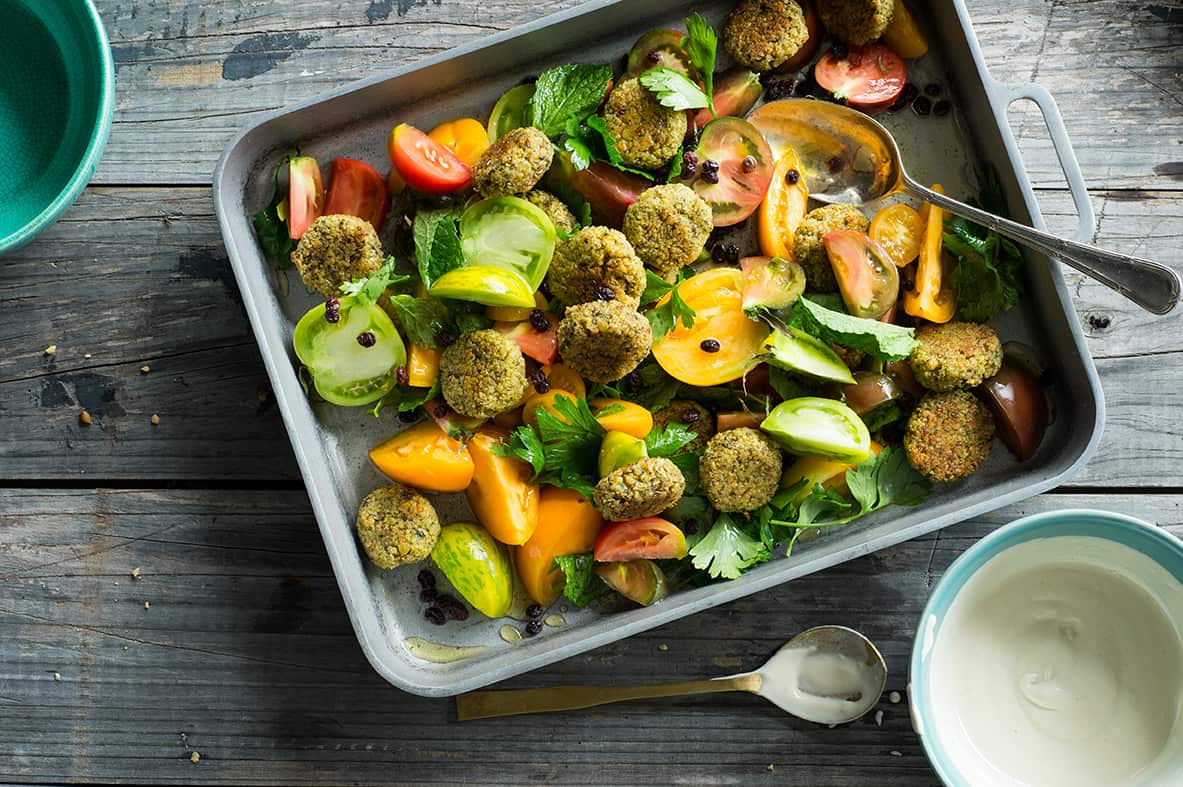 Baked falafel with tomato herb salad & tahini sauce