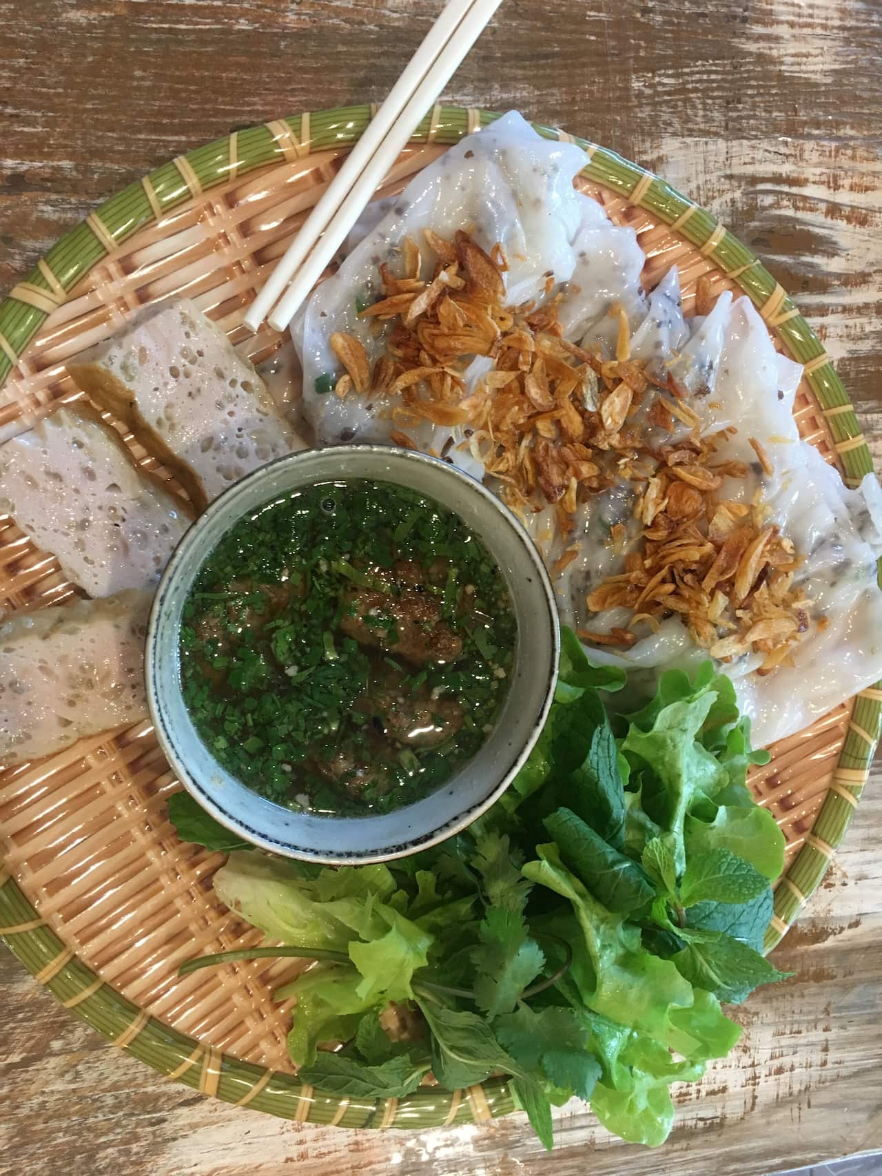 Banh Cuon Ba Oanh: The batter is thinly spread on the steamer to make the rice noodles.