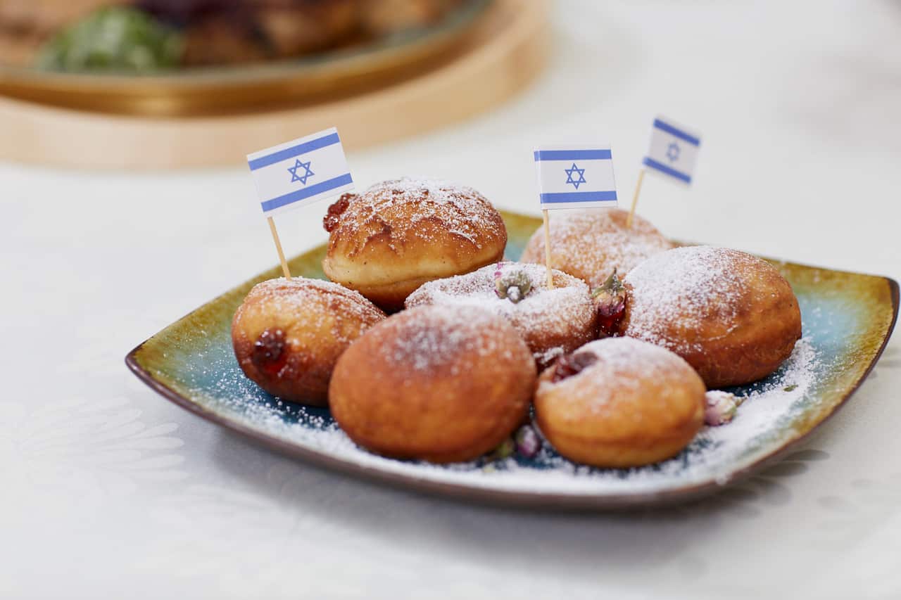 Rose and strawberry sufganiyot (Jam doughnuts)