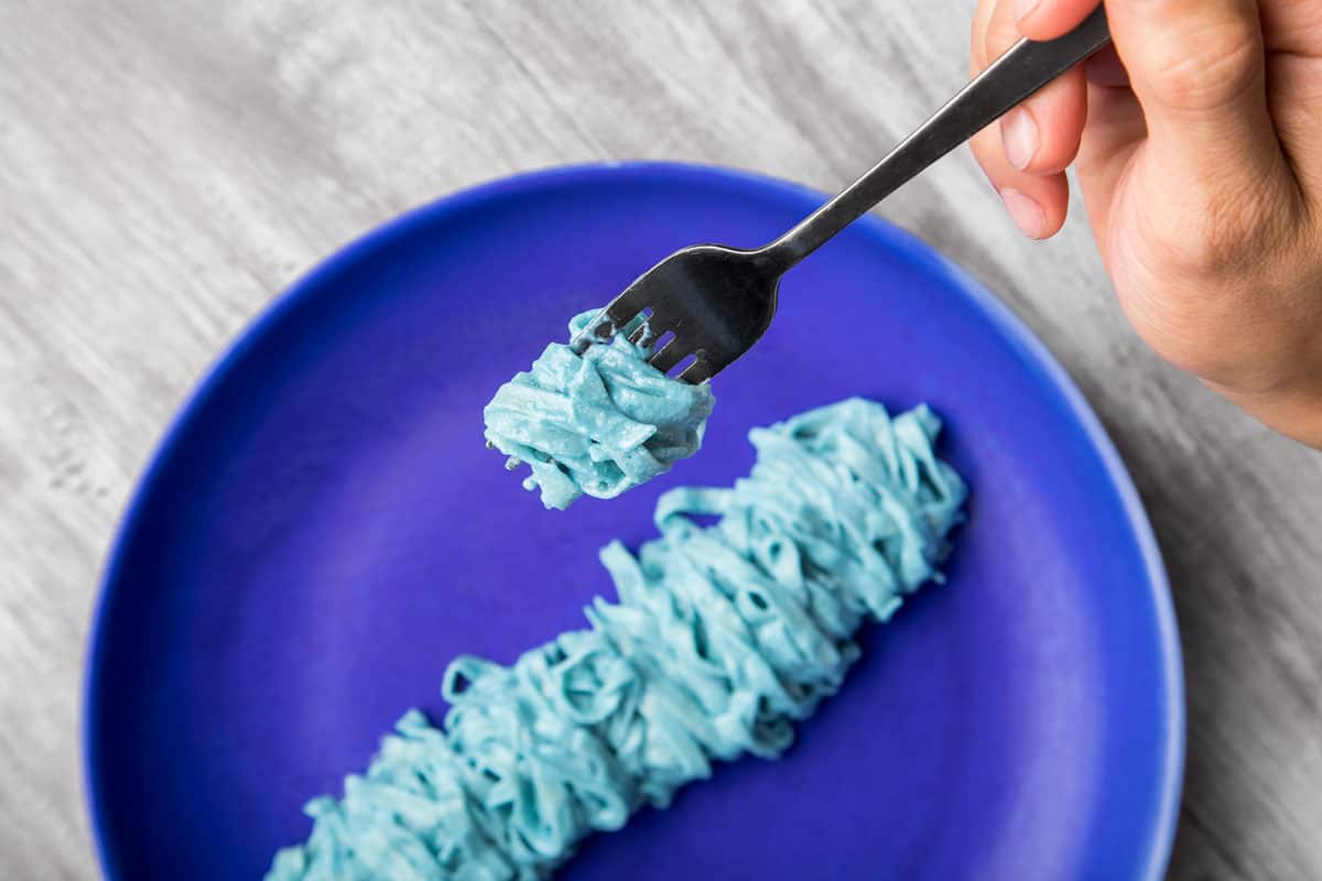 Blue spirulina tagliatelle with Dungeness crab turns is one vegan pasta option on offer.