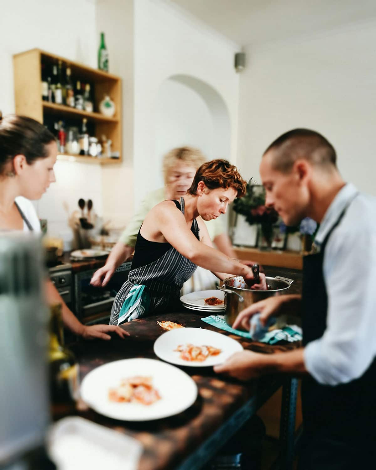 Brigitte Hafner, Renee Trudeau and Tansy Good in the kitchen at Emiko Davies lunch 02.03.17