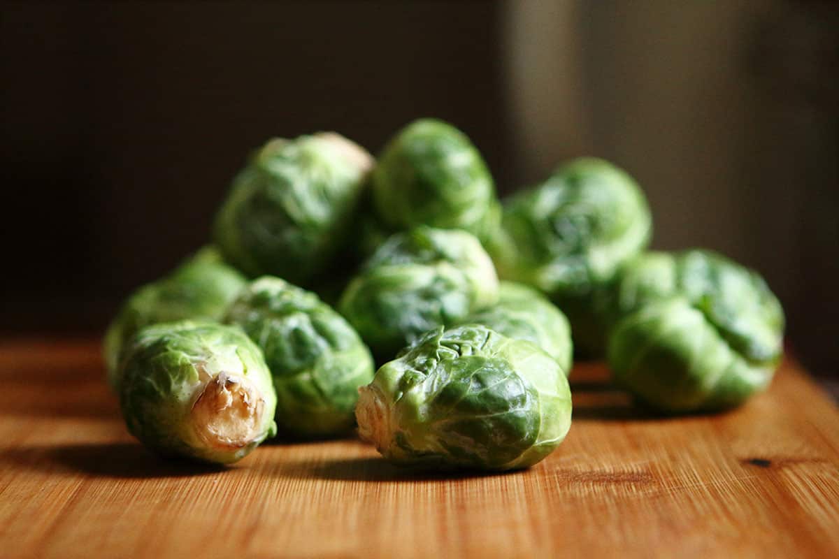 Brussels sprouts on a chopping board