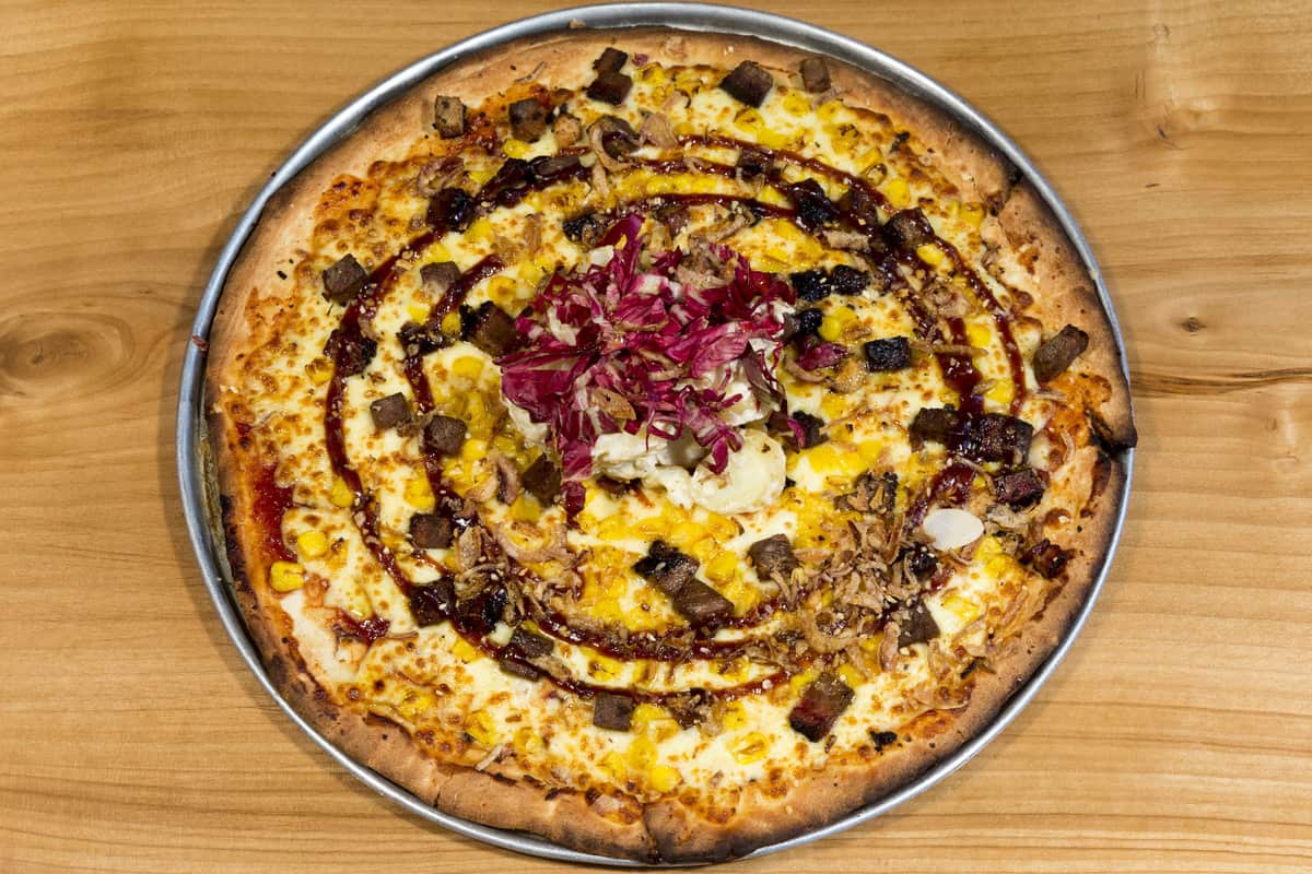 Brooklyn Crispy serves dogs pizza