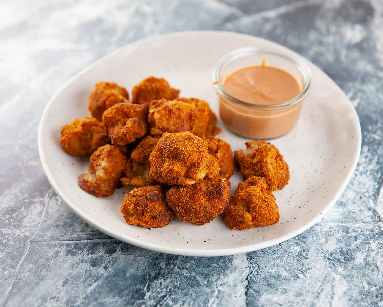 Crispy gluten-free cauliflower nuggets with easy barbecue sauce