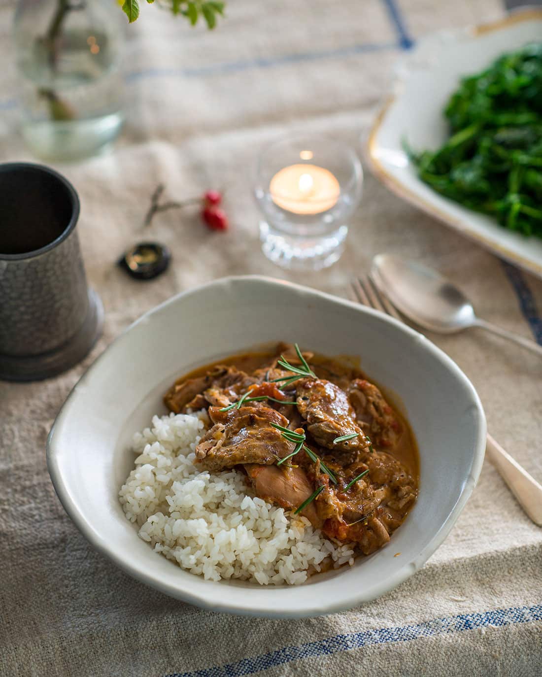 Chicken thigh casserole with rosemary, garlic, tomato and anchovies
