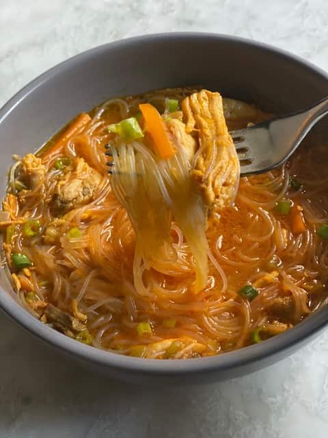 Filipino chicken sotanghon features transparent chewy noodles.