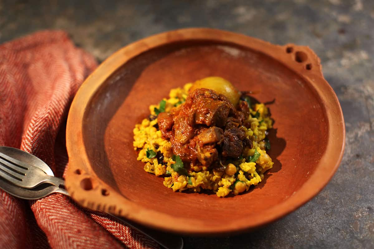 Chickpea and freekeh skhina with lamb and dates